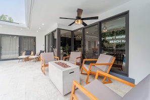 Enjoy the evenings with cozy seating around the gas fireplace
