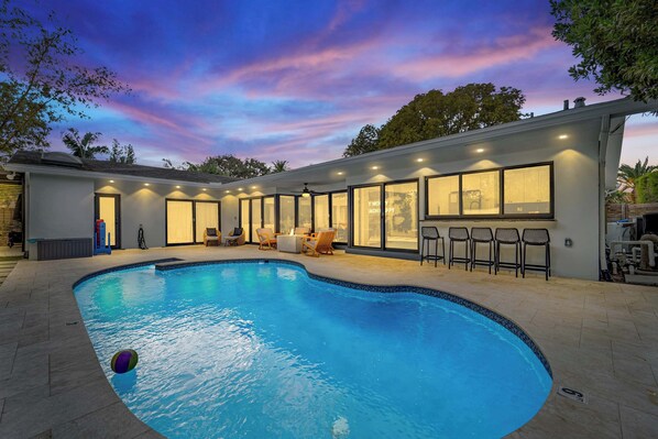 As the sun sets, our backyard comes alive—glowing under the night sky. 