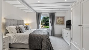 Bedroom two has a view across the quiet street