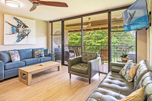Bright and airy living space with stunning Hawaiian decor and a laid-back vibe.