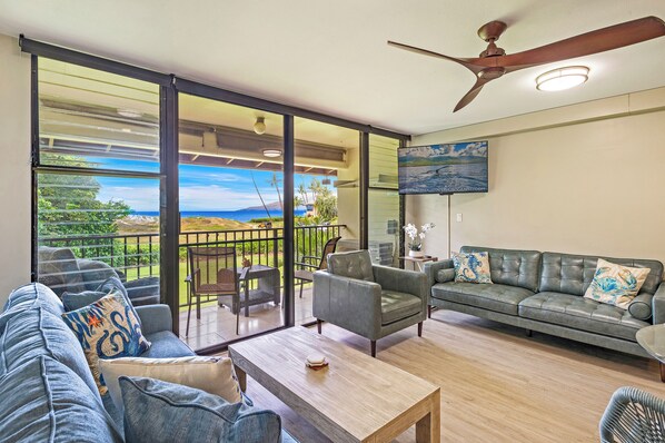 Relax in this tropical inspired living room with ocean breezes and island charm.