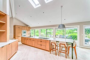 Spacious open kitchen filled with natural light