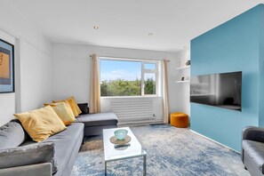 Cozy lounge with an L-shaped double sofa bed for relaxation