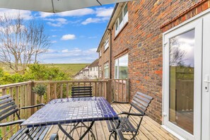 Beautiful balcony with garden views and fresh outdoor ambiance