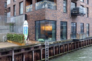 Apartment located just above the water with a private balcony above the water and a private terrace with direct access to the apartments living room