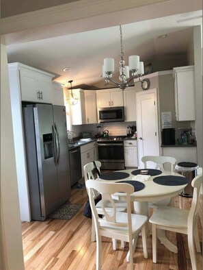 The open, airy kitchen offers ample space & all the comforts of home
