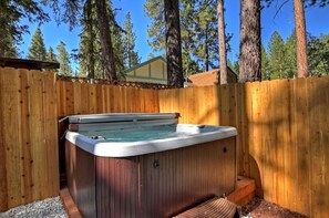 The cabin has a hot tub for guest use.