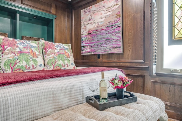 Sink into this king-sized bed with plush pillows and soft linens! 