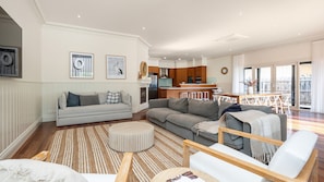 Main living with gas fireplace and smart Tv