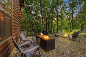 Propane firepit along with wood fire pit.  Your choice!