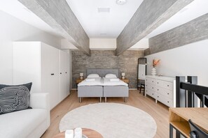 Apartment bedroom with a 160cm wide bed and a bed sofa