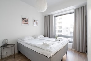 Apartment bedroom. There is two 80cm wide beds that you can separate from each other.