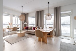 Apartment living room & dining area is spacious and modern. The balcony goes around the whole apartment.