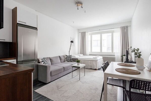 The apartment has a large living room where you can spend time with your family and friends.