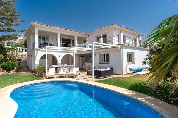 Property building with heated pool