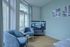 Living room /Sofa bed / dining area / TV