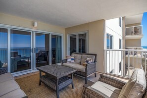 Sandy Key Unit 513 by PKRM - Primary bedroom walks out onto gulf front balcony.