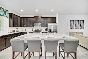 Fully Equipped Kitchen With Stainless Steel Appliances