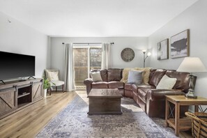 Curl up in the serene living room & stream your favorites on the smart TV