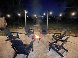 Spacious Backyard fire pit area