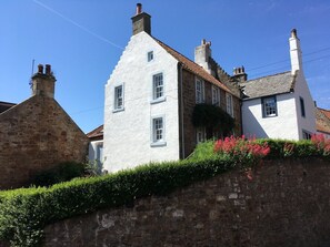 Side view of house - side garden is hidden behind the hedge