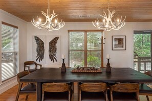 Seating for 8 at the dining room table plus a kitchen island. 