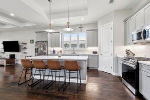 Island and open kitchen for entertaining 