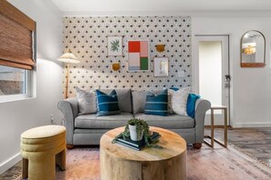 Cozy vibes and modern design in the comfortable and stylish living room.