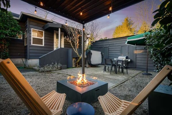 Gather by the fire pit at sunset for a cozy, unforgettable evening!