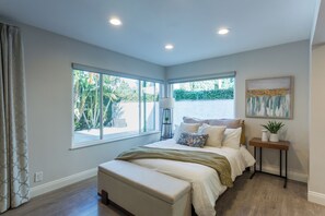 Here is your bedroom space. You can use the shades for a mid day nap if needed. 
