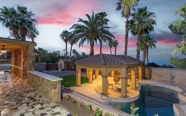 Beautiful luxury estate with covered patio, pool, spa, game room, and courtyards