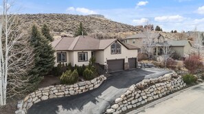 A large private drive with 2 car garage and room for several cars on the driveway