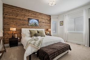 A spacious Master suite with Organic Helix King Bed, and Fun Swiss Accents