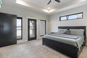Enjoy a king bed with ensuite bathroom and beautiful views in the primary suite - walk out to your private patio to enjoy the views.