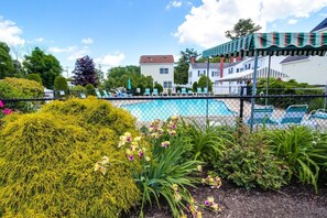 Shared seasonal pool. 