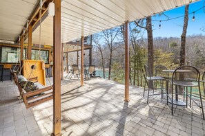 Enjoy the surrounding nature on our two large patios with lake views or walk the short path directly to the water.