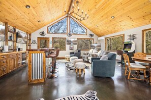 With large living spaces, including a game room with a, wet bar, Smart TVs, and video games there is always something fun to explore.