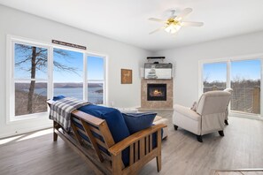 Inside, there are amenities for up to 12 guests, a fully stocked kitchen, two living spaces, and an epic game room!