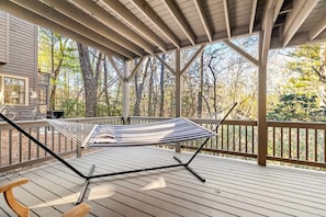 Deck: Enjoy a tranquil afternoon in the warm sun and cool breeze as you lounge on our comfy hammock