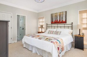 Bedroom 1: A spacious, bright room with a soft and comfortable king bed perfect for afternoon naps