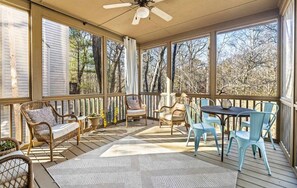 Covered Deck: Sip a cup of tea or play a board game in our screened deck 