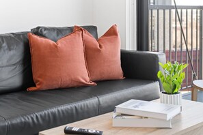 As you take a seat in the living room, the comfortable furniture and tasteful design make it easy to unwind.