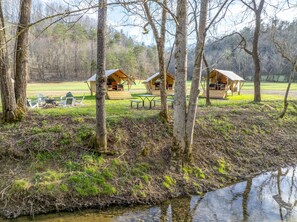 This group site has it all! Private fire pit w/ cooking grill and outdoor seating for 8!