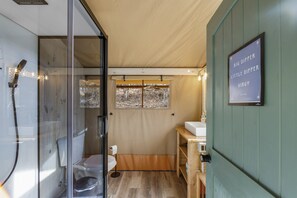 Now this is camping! The mini split is cleverly installed above the door.