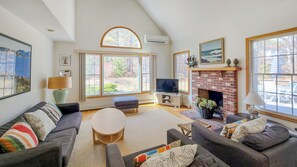 Living room with comfortable seating and flat screen TV