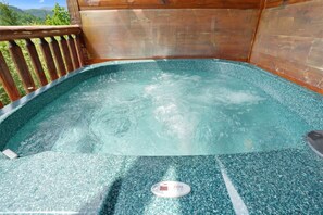 Soak under the stars or greet the morning with mountain air in this spacious, jetted hot tub just steps from the back door.