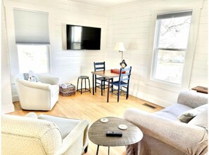 Open concept living, dining and kitchen.