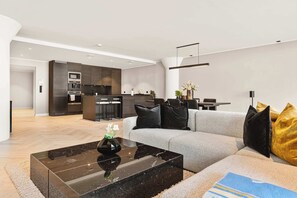 Well-lit, airy apartment with a modern aesthetic.