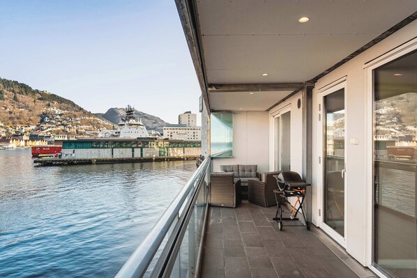 Enjoy the harbor views from your private balcony.
