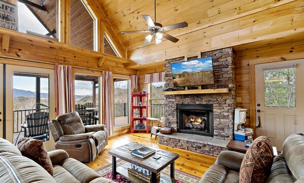 Open concept Living Room with gas fireplace